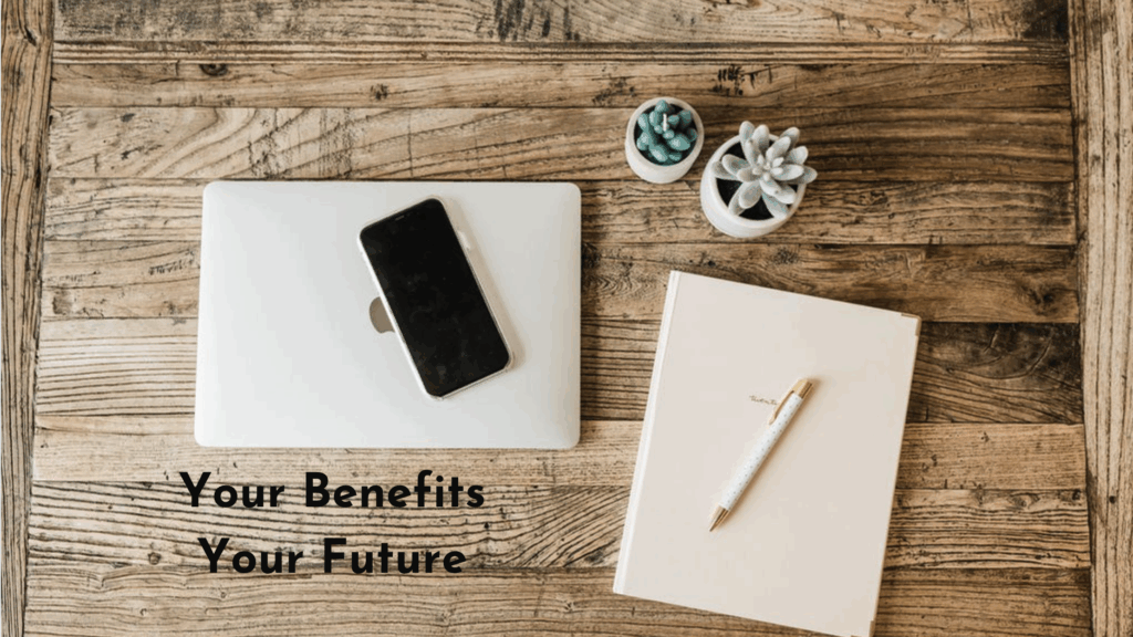 Computer and notebook to help with Open Enrollment 2026