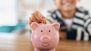 picture of a child with a piggy bank