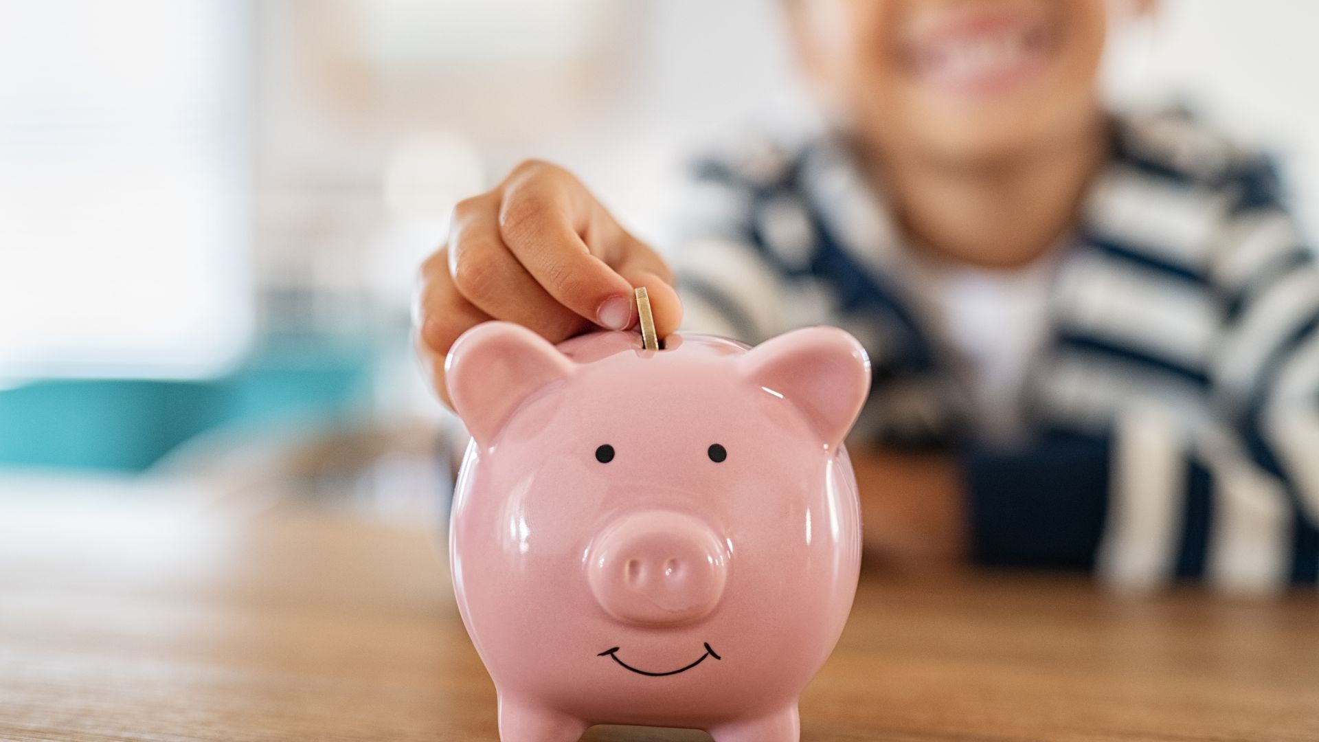 picture of a child with a piggy bank
